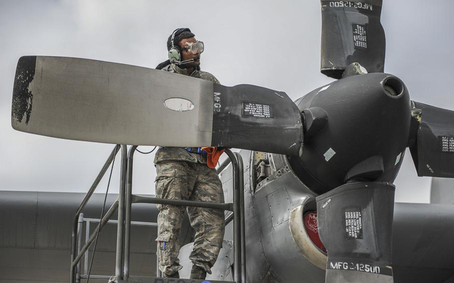 Airman 1st Class Anthony Trim a crew chief, 374th Aircraft Maintenance Squadron performs a prop oil service check on a C-130 hercules Mar. 3, 2014 during a Samurai Readiness Inspection at Yokota Air Base, Japan. Maintainers were tested on their skills to provide safe and ready support during simulated contingencies. 