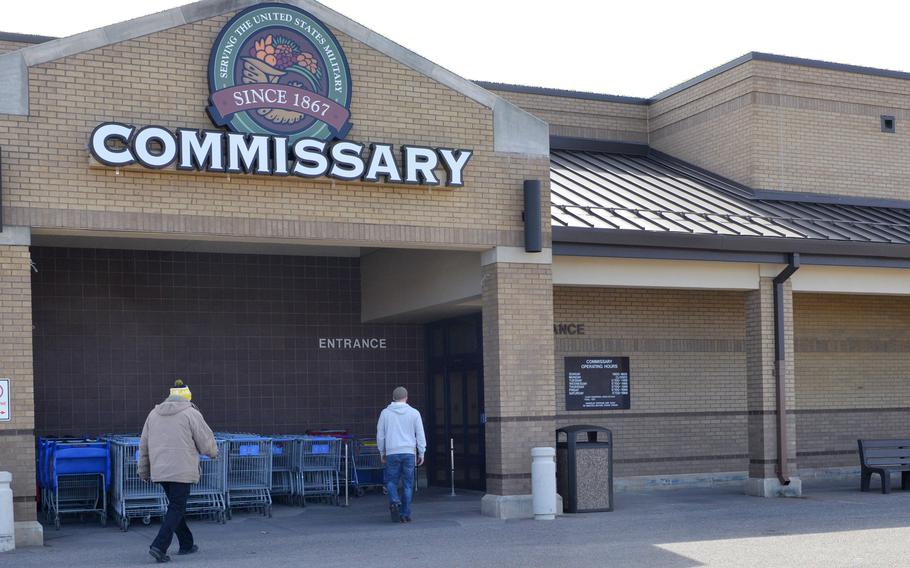 Customers prepare to enter the commissary Feb. 27, 2014, at McConnell Air Force Base, Kan. 
