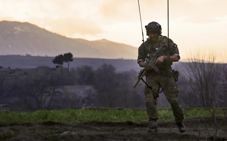 A U.S. Special Forces soldier returns from leading a patrol of Afghan National Army commandos during an operation in the Khogyani district of Nangarhar province, Afghanistan, March 21, 2014. 