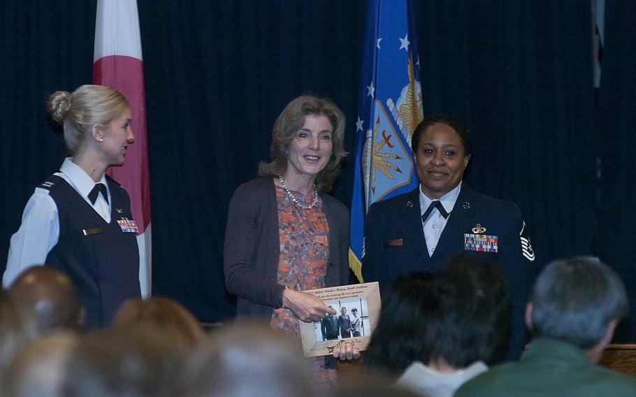 U.S. Ambassador to Japan Caroline Kennedy was awarded with a commemorative picture after speaking at the Yokota Air Base Women's History Luncheon at the Yokota Enlisted Club on April 4, 2014.