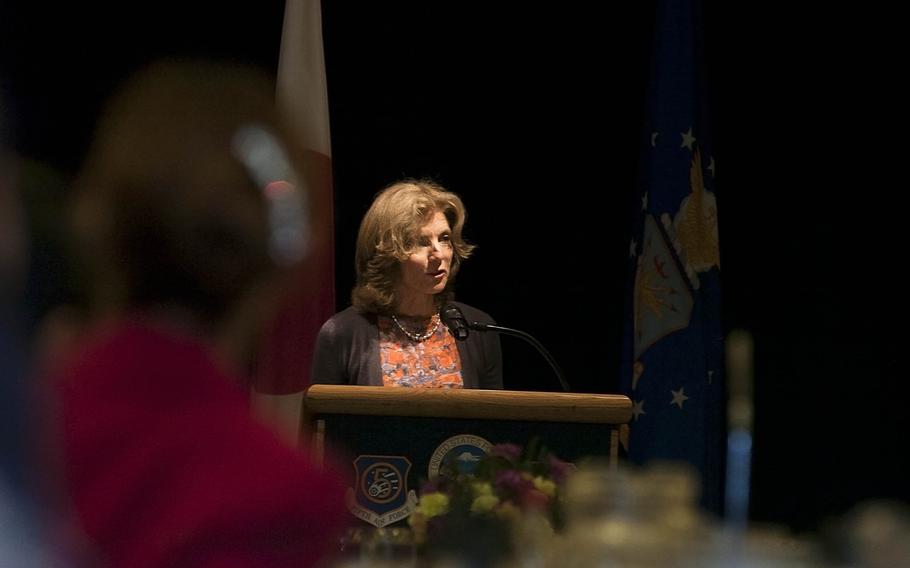 U.S. Ambassador to Japan Caroline Kennedy speaks to a crowd of servicemembers and distinguished guests at the Yokota Air Base Enlisted Club on April 4, 2014. She told the audience that women in today's military are setting the stage for all future women and girls who will come after them. 