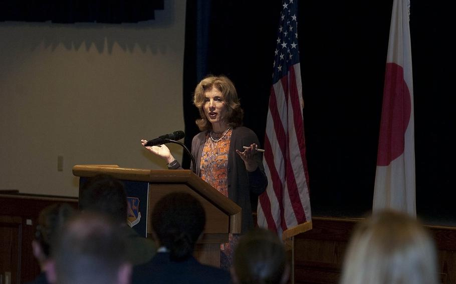 U.S. Ambassador to Japan Caroline Kennedy speaks to a crowd of servicemembers and distinguished guests at the Yokota Air Base Enlisted Club on April 4, 2014. Kennedy, the daughter for a former president, spoke of women's accomplishments in the world and the military during the luncheon.