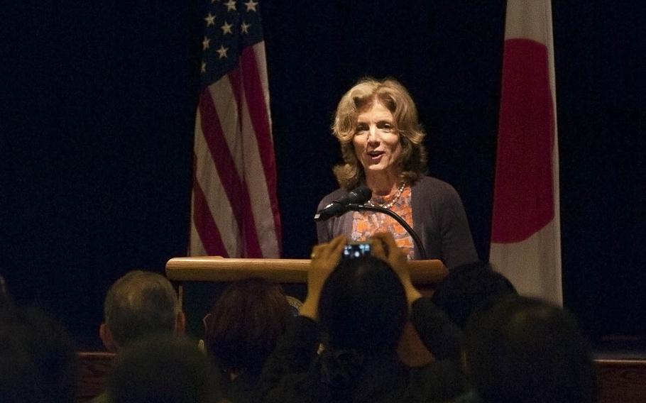 U.S. Ambassador to Japan Caroline Kennedy speaks to a crowd of servicemembers and distinguished guests at the Yokota Air Base Enlisted Club on April 4, 2014.