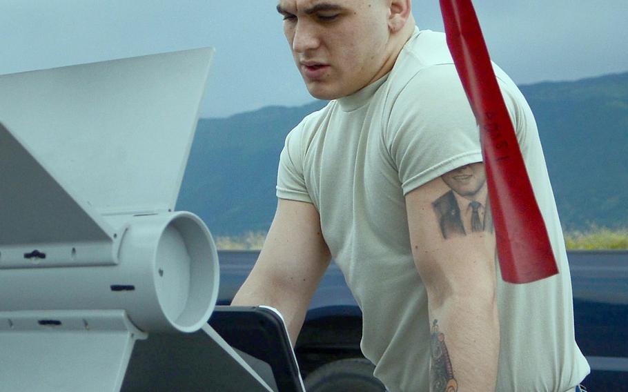 Airman 1st Class Nicholas Nadeja, 31st Munitions Squadron line delivery crew member, reviews technical orders for delivering procedures at Aviano Air Base, Italy, on June 26, 2013. Nadeja was identified Saturday as an airman who died Friday, April 4, 2014, while hiking in the mountains above Aviano Air Base.