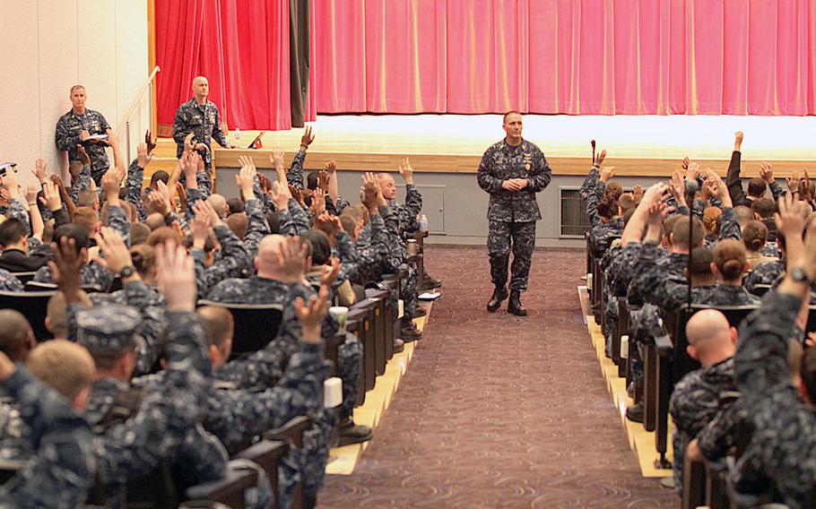 Master Chief Petty Officer of the Navy Michael D. Stevens speaks to sailors at an all-hands call at Yokosuka Naval Base, Japan, on April 23, 2014. Taking an informal poll, Stevens asked the sailors to raise their hands if they would rate Navy morale as ''good.''