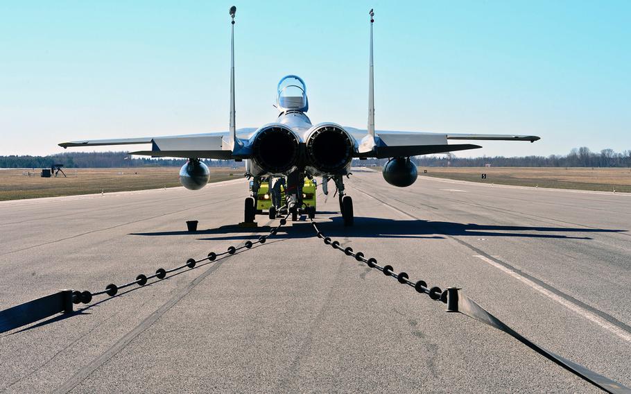 An F-15C Eagle sits on the runway after a certification barrier engagement at Amari Air Base, Estonia, April 22, 2014. Members of the 48th Air Expeditionary Group recently took a trip to Amari AB to engage and certify the aircraft arresting system, taking a critical step toward validating the new NATO Forward Operating Base. 