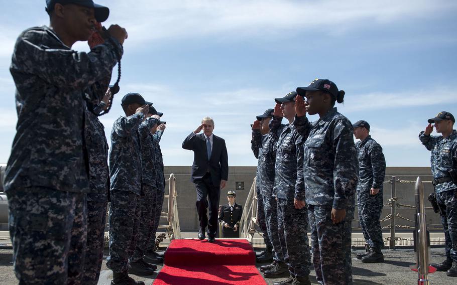 Sideboys render honors as Secretary of the Navy Ray Mabus steps aboard the guided-missile destroyer USS Bulkeley on April 1, 2014. Bulkeley, deployed as part of the Harry S. Truman Carrier Strike Group, is operating in the U.S. 6th Fleet area of responsibility.