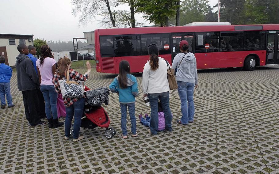 Families wave goodbye Wednesday, April 30, 2014, to soldiers with Company C, 1st Battalion, 214th Aviation Regiment, who are deploying to Kuwait. The Army helicopter medical evacuation unit has also begun to relocate to Grafenwoehr, Germany, a move expected to be complete by the summer of 2015.