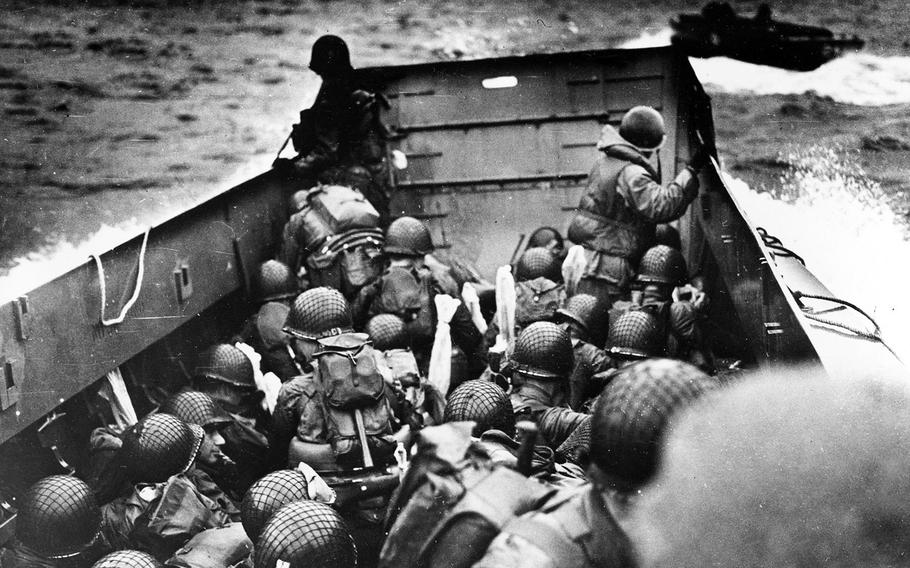 A U.S. Coast Guard landing barge approaches the shore at Normandy, France, on, June 6, 1944.