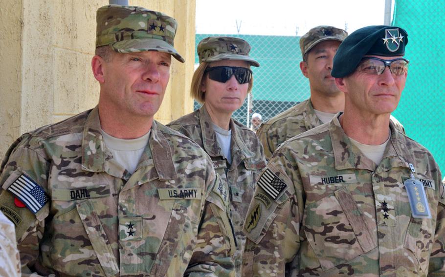 Maj. Gen. Kenneth R. Dahl, then-deputy commanding general for support, U.S. Forces Afghanistan, tours the detention facility September 20, 2012, in Parwan, Afghanistan, with Lt. Gen. Keith M. Huber, right, and Brig. Gen. Dash Jamieson, middle.