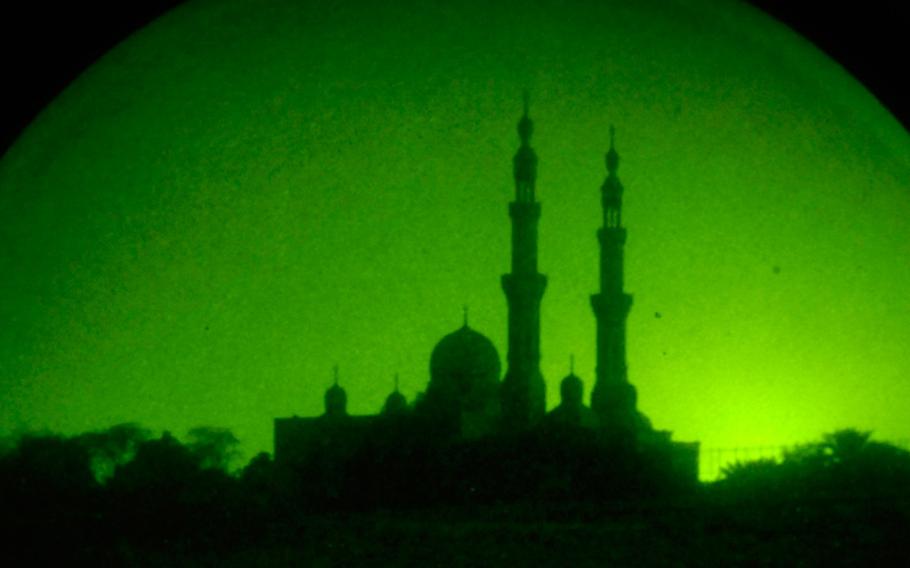 A mosque in Al Furat, Iraq, stands prominent before dawn Aug. 9, 2007.