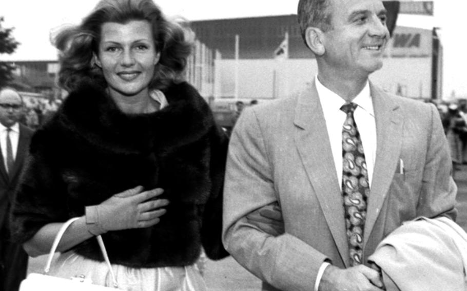 Actress Rita Hayworth and her husband, producer James Hill, arrive in Frankfurt from the U.S. on their way to Berlin in June, 1959.