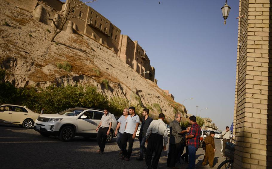 Traffic streams by the Irbil Citadel Ð a World Heritage site in the center of the capital of Iraqi Kurdistan - has protected its inhabitants for Millennia and, until recently, was billed as the planetÕs oldest inhabited structure. Its residents were recently moved out to make way for renovations to encourage tourism.
                