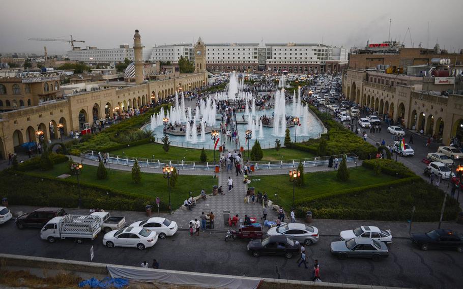 A view of the park and surrounding souq, a traditional market, from the flanks of the Irbil Citadel in the center of the capital of Iraqi Kurdistan, Aug. 25, 2014.
                