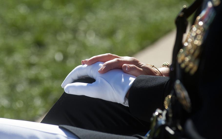 General Joseph Dunford holds hands with his wife during the Passage of Command ceremony at the Marine Barracks in Washington, D.C., on Oct. 17, 2014. Dunford was assuming command of the USMC from General James Amos, who was retiring. 