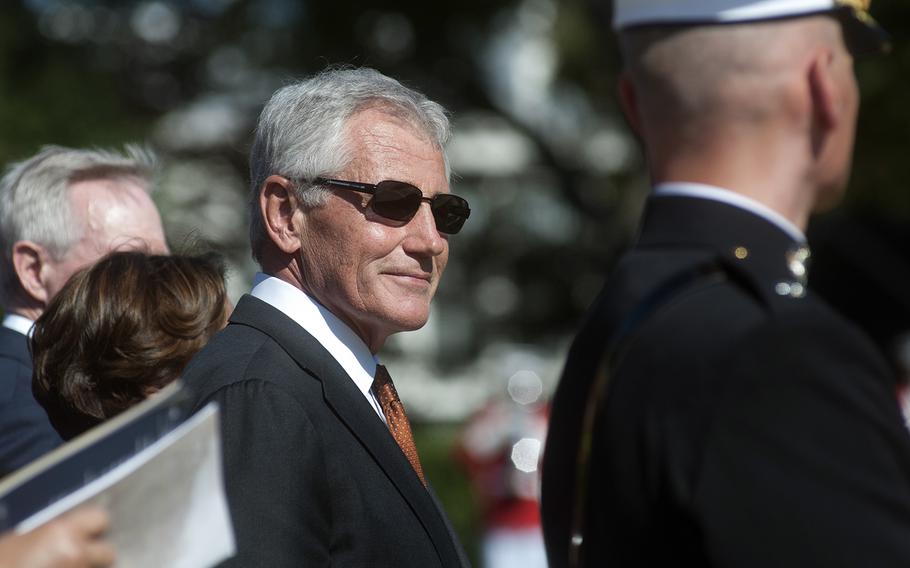 Defense Secretary Chuck Hagel enjoys the ceremony Passage of Command at the Marine Barracks in Washington, D.C., on Oct. 17, 2014.
