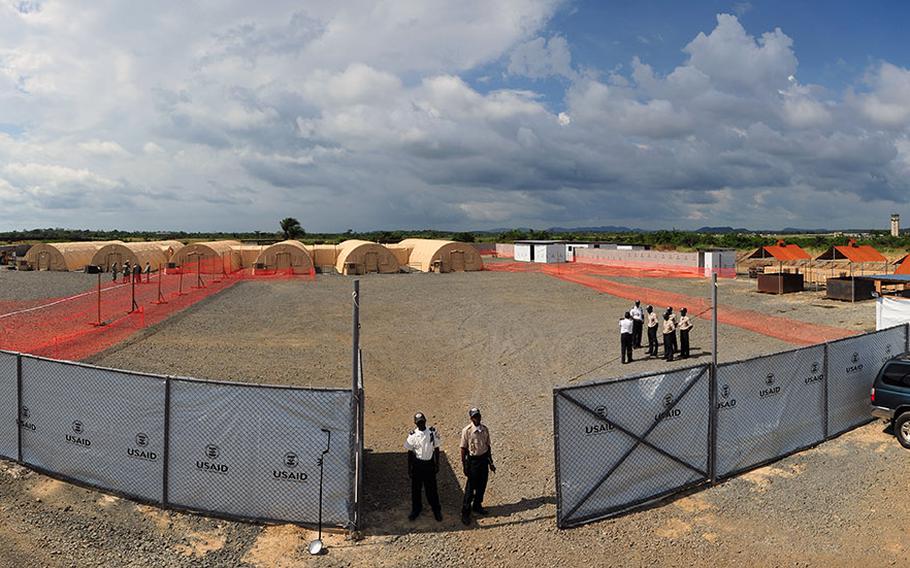 A photo illustration shows the Monrovia Medical Unit, a facility built specifically to care for medical workers infected with the Ebola virus. This image, created using photo merging techniques to create a panoramic view, shows the The MMU as it sits about 30 miles outside Liberia's capital on Nov. 4, 2014.