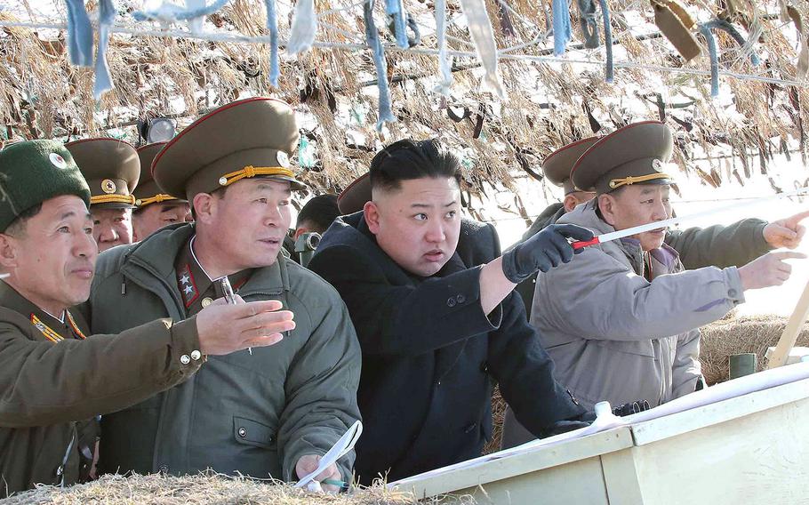North Korea leader Kim Jong Un visits the Wolnae-do Defence Detachment on the western front line, according to KCNA news agency which released this image on March 12, 2013. Kim executed one of his army generals in January 2015, according to a South Korean official in Seoul.