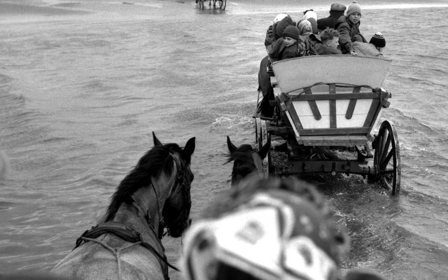 A wagon train to Neuwerk, West Germany, in 1960.