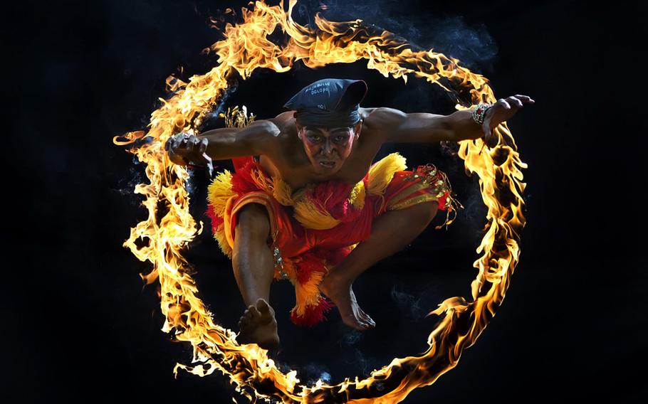 Aprison Aprison, "Jump!" | One of traditional attraction in Indonesia Culture called Bujang Ganong. He jumped into the circle of fire.