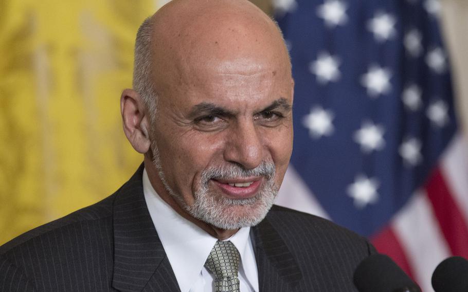 President Ashraf Ghani of Afghanistan listens during a press conference at the White House, Mar. 24, 2015.
                