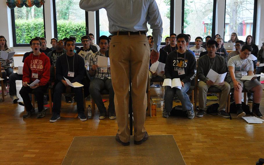 Mark Babcock, the guest choral conductor for the DODDS-Europe Honors Music Festival, leads the 80-member student choir Tuesday during rehearsals in Oberwesel, Germany.