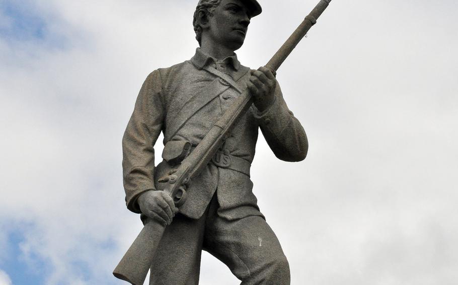 A statue of a Union soldier stands as a monument to the soldiers of the 128th Pennsylvania Volunteers at the Antietam National Battlefield Park. A member of the unit, Ignatz Gresser, was among 20 Union soldiers honored Saturday for having been awarded the Medal of Honor at Antietam, the bloodest one-day battle in U.S. history.