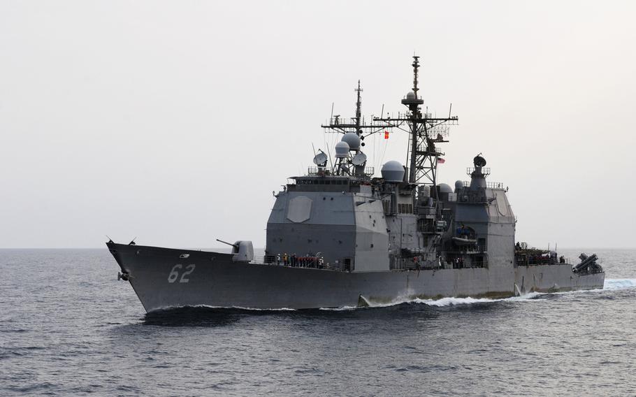 The guided-missile cruiser USS Chancellorsville (CG 62) transits alongside the aircraft carrier USS Ronald Reagan (CVN 76) for a fueling at sea. Ronald Reagan is conducting operations supporting maritime security operations and theater security cooperation efforts in the U.S. 5th Fleet area of responsibility.