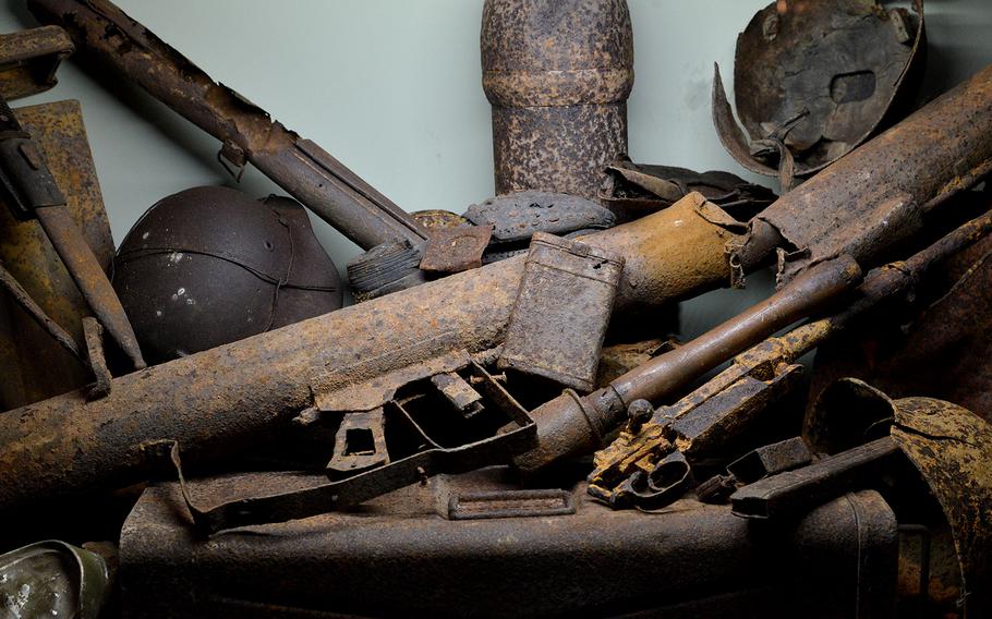 Rusted military equipment found in Normandy on display at the Overlord Museum in Colleville-sur-Mer, France. The museum, near Normandy American Cemetery, has a large display of World War II-era vehicles and equipment on display.