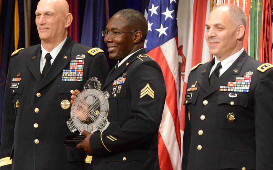 Sgt. William Dashields, Jr. accepts the Best of the Best Army Award for Maintenance Excellence from Army Chief of Staff Gen. Ray Odierno during the 11th Annual Chief of Staff of the Army's Combined Logistics Excellence Awards ceremony at the Pentagon, June 10, 2015. The award went to the 7th Joint Multinational Training Command, Grafenwoehr, Germany. Lt. Gen. Gustave F. Perna, right, deputy chief of staff for logistics, G-4., also presented the award.