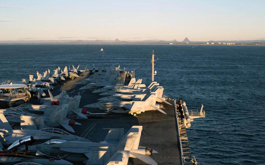 The USS George Washington prepares for a port visit in Brisbane, Australia, last week ahead of Talisman Saber 2015. The military exercises will mostly involve U.S. and Australia troops, but they will be joined by hundreds of personnel from New Zealand and Japan who participating for the first time since the exercise began in 2005.
