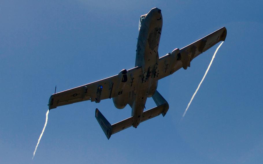 An A-10C Thunderbolt II makes a bombing run at mock targets June 12, 2015, during the Sabre Strike training exercise in Rukla, Lithuania.