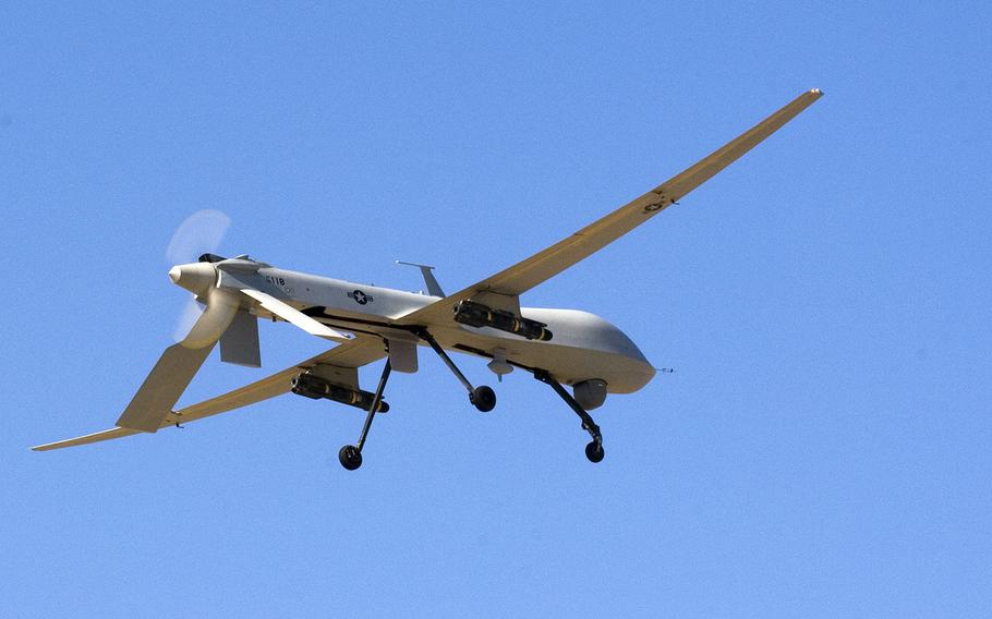 A U.S. Air Force MQ-1 Predator prepares to land at Joint Base Balad, Iraq, after a November 2008 mission.