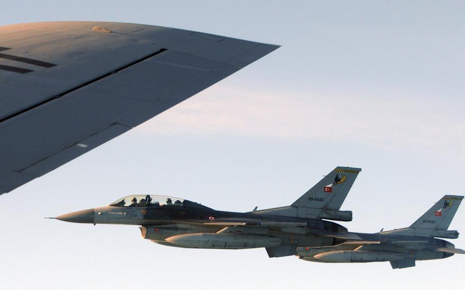 Two Turkish Air Force F-16 Fighting Falcons fly alongside a 351st Air Refueling Squadron KC-135 Stratotanker over the North Sea during a refueling mission in support of Exercise Bold Avenger Sept. 23, 2009. Turkey on Monday scrambled two F-16s in response to what Turkey said was a violation of its airspace when a Russian fighter briefly crossed over the Syrian border.
