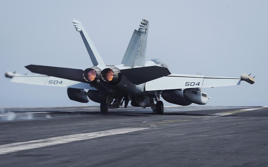 An EA-18G Growler launches from the flight deck aboard the aircraft carrier USS Theodore Roosevelt on Sept. 17, 2015 as part of Operation Inherent Resolve.