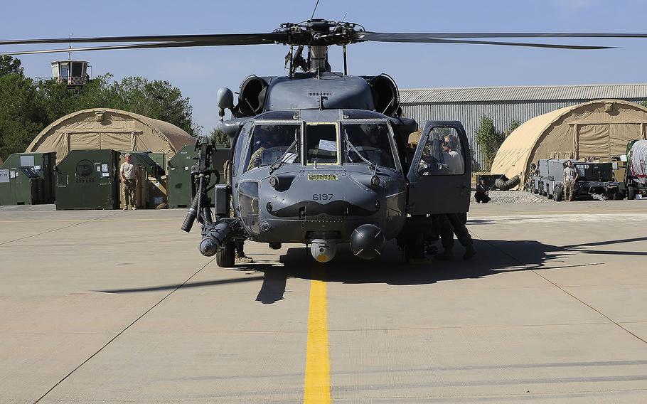 A U.S. aircrew prepares to unload an HH-60G Pave Hawk at Diyarbakir Air Base, Turkey, on Oct. 1, 2015.