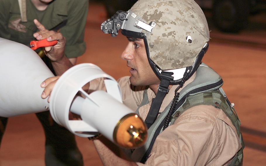 Capt. Taj T. Sareen, Marine Fighter Attack Squadron F/A-18 pilot and quality assurance safety officer, conducts pre-flight checks to ordnance loaded on the aircraft before flight operations as part of Southern Frontier 2012 Aug. 17. Sareen has been identified as the pilot who died in an F/A-18 crash on Wednesday, Oct. 21, 2015, near RAF Lakenheath in England.