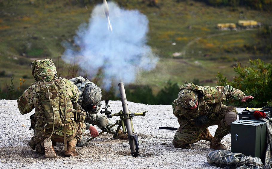 U.S. Army paratroopers fire an M224 60mm mortar system during a live-fire exercise at Pocek Range in Postojna, Slovenia, on Oct. 19, 2015.