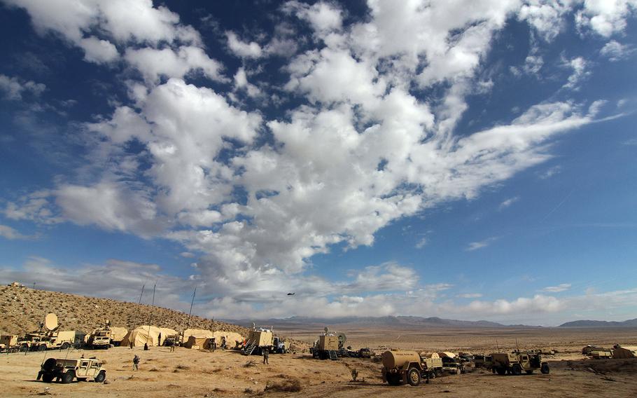 At the 1st Armored Brigade Combat Team, 1st Cavalry Division tactical assembly area, leaders plan and coordinate missions for nine battalions spread out over 500 square kilometers at the National Training Center at Fort Irwin, Calif., in October, 2015.
Decisive action rotations ensure BCTs remain versatile, responsive and consistently available for the current fight and unforeseen future contingencies. (U.S. Army photo by Staff Sgt. , 1st Armored Brigade Combat Team Public Affairs, 1st Cavalry Division)