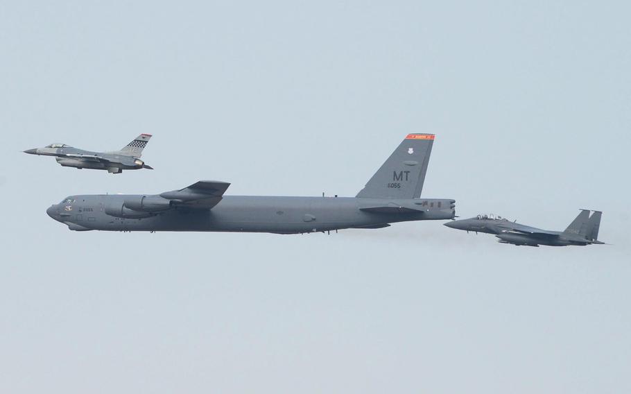 A U.S. B-52 bomber from Andersen Air Force Base, Guam, flew low over Osan, South Korea, in response to a recent nuclear test by North Korea. The B-52 was joined by Republic of Korea F-15 fighter aircraft and U.S. F-16 fighter aircraft.