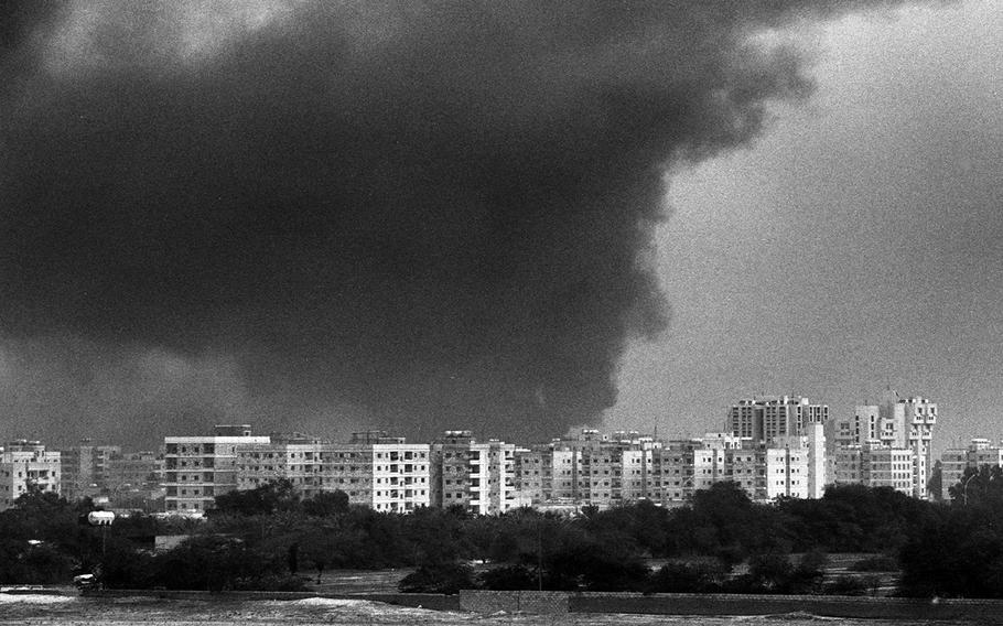 Smoke from oil fires set by Saddam Hussein's troops in Kuwait during Operation Desert Storm in February, 1991.