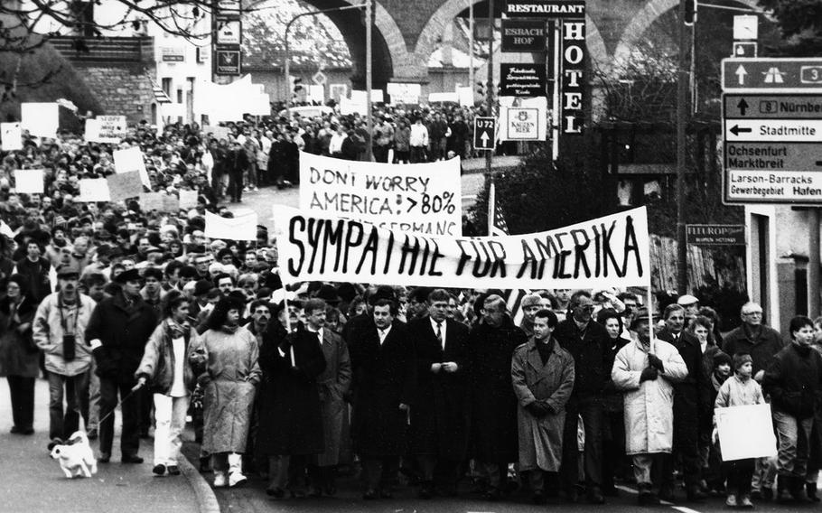 A crowd of more than 5,000 Germans shows support for U.S. involvement in the Gulf War with a march through the streets of Kitzingen, Germany, in February, 1991.