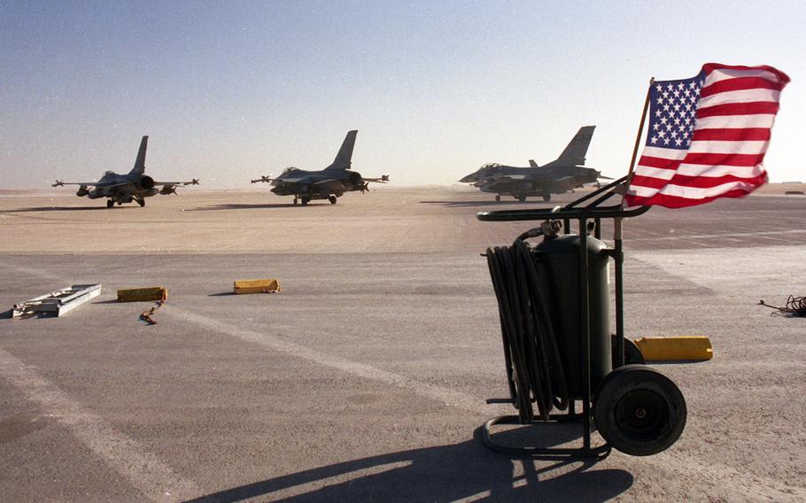 All is quiet for the time being on the flight line at a base in central Saudi Arabia in January, 1991, but planes are ready for the next mission against Iraqi targets in the early stages of the Gulf War's air campaign.