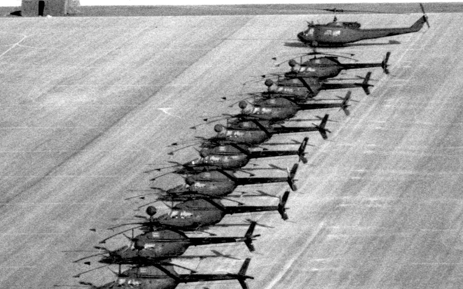 Helicopters are lined up in the Saudi Arabian desert during Operation Desert Shield in December, 1990.