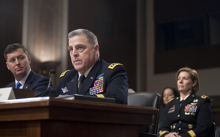 Army Gen. Mark Milley responds to questioning during a Senate Armed Services Committee hearing on Capitol Hill in Washington on Tuesday, Feb. 2, 2016. Looking on are Acting Secretary of the Army Patrick Murphy and Maj. Gen. Laura Richardson.