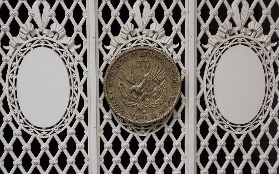 The Department of Veterans Affairs seal on a gate at the agency's headquarters in Washington, D.C.