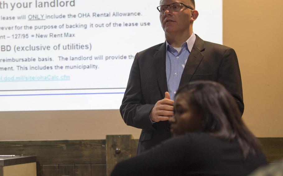 Leslie Jett, the Bahrain Country Allowance Coordinator, takes questions during a town hall meeting at Naval Support Activity Bahrain Tuesday, March 1, 2016. The meeting was to brief U.S. personnel living in Bahrain about allowance changes to meet the rise in utility costs in the country.