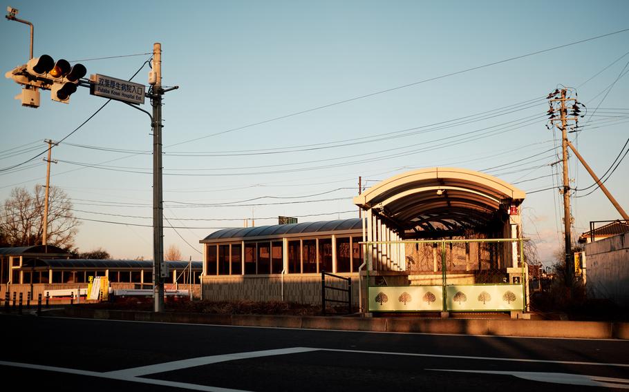 The entrance to an underground crosswalk leading to the abandoned Futaba Kosei Hospital in Futaba, Japan, remains barricaded Feb. 10, 2016. To keep people out, the fences in front of these pedestrian traffic areas are taller and sturdier than the typical barricades found along the highway. 