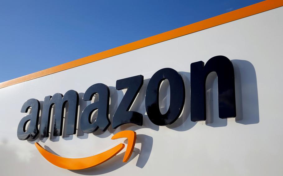 The logo of Amazon is seen at a company logistics center on August 8, 2018. 