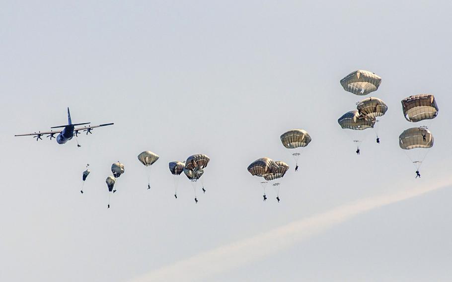 Paratroopers drop into the Hohenfels, Germany, training area Wednesday, Aug. 26, 2015. Hundreds of American, British and Italian paratroopers will take part in the Saber Junction 16 exercise next week in the same area and a German civilian field two miles away.